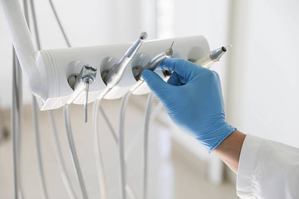 Professional Invisalign Clear Aligners technician working in Ferry Pass, FL